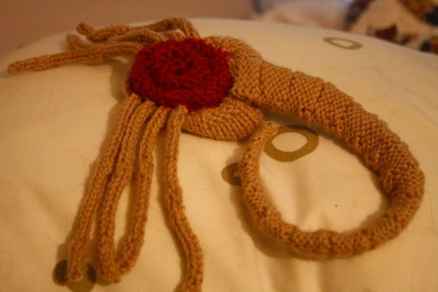 Awwww. A squishy stitched alien parasite.