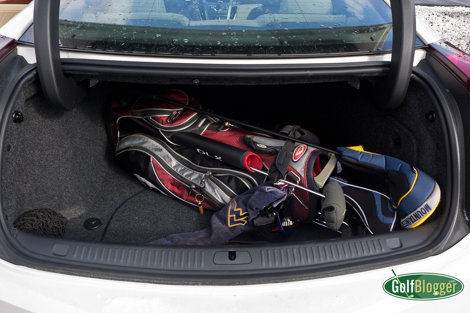 Clubs In Trunk of Cadillac CTS Coupe
